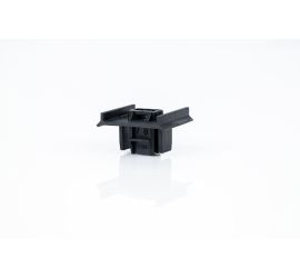 Een zwarte SC2 solar clip op een witte achtergrond.